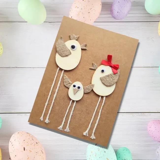 Adorable Handmade Craft Easter Card with Chicks Family Adorable handmade craft Easter card featuring a family of chicks beside eggs, set against a colourful background.
