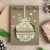 Beautiful Handmade Christmas Card with festive lace ball, handwritten text and stars. Made in the UK.