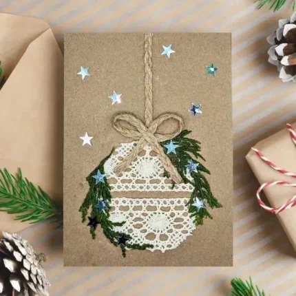 Beautiful Handmade Christmas Card with a lace ball and stars made of eco-friendly materials.
