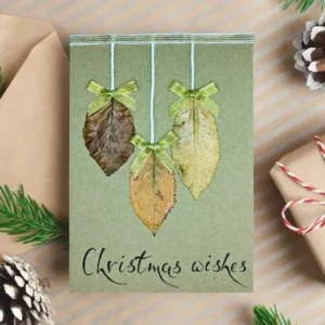 Best Merry Christmas Card for Someone Special image 1 Best Handmae Merry Christmas card for Someone Special made of three dry leaves and festive text below.