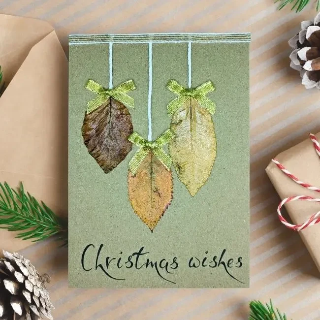 Best Merry Christmas Card for Someone Special image 1 Best Handmae Merry Christmas card for Someone Special made of three dry leaves and festive text below.