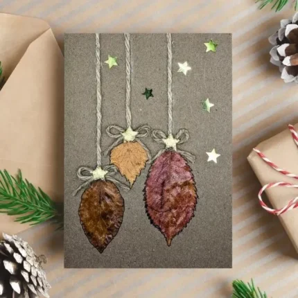Best Handmae Merry Christmas card for Someone Special made of three dry leaves and paper stars.