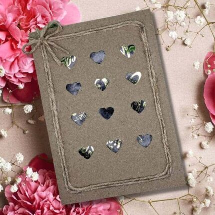 Unique Handmade Valentine's Card featuring colorful hearts and cotton string.