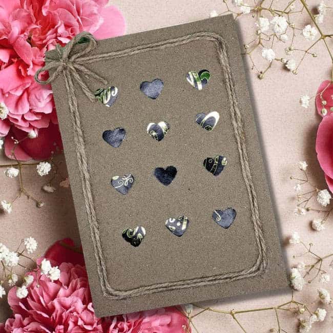 Unique Handmade Valentine's Card featuring colorful hearts and cotton string.