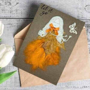 Handmade romantic card for her featuring an orange feathers and wood alongside a delicate butterfly design.