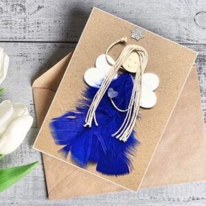 Charming Handmade Card for Women - A Brilliant Gift Idea Charming Handmade Card for Women made of dark blue feathers and wooden wings on brown paper.