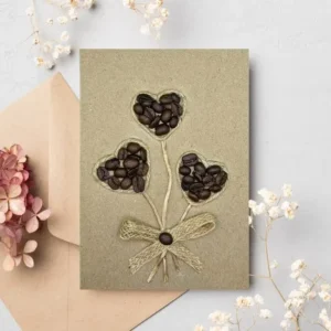 Elegant Handmade Thank You Greeting Card features three hearts made of coffee and cotton string