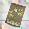 Festive Handmade Colourful Happy Easter Card with Yellow Spring Flowers Festive handmade colourful happy Easter card with Yellow Spring Daffodil Flowers and Egg. Made in the UK.