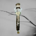 The image shows a Handcrafted Razor Shell Blessing ornament. The angel is holding a white heart in its hands with 'Thank You' text.