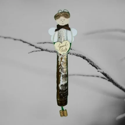 The image shows a Handcrafted Razor Shell Blessing ornament. The angel is holding a white heart in its hands with 'Thank You' text.