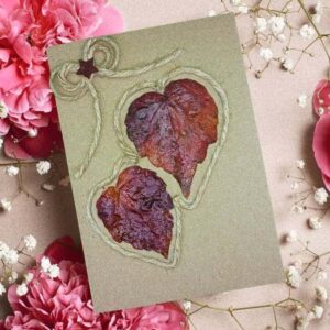 Handmadae and Beautiful Valentine's card for wife or husband with two autumn leaves, cotton bow and coffee bean.