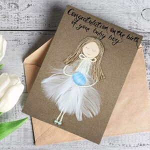 Handmade Beautiful Congratulation Card On the Birth of Baby Boy Handmade congratulation card on the birth of baby boy for her. Made in Bollington, UK. Made of white feathers.