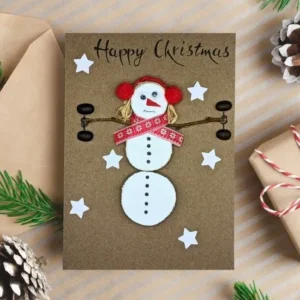 Handmade Gym-Themed Christmas Card - Unique Gym Christmas Card Handmade Gym-themed Christmas card - Unique greeting card with Mrs. Snowflake lifting two dumbbells.