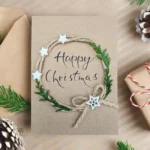 Handmade Happy Christmas card that is personalised with a green festive wreath, twine detailing, and white star accents.