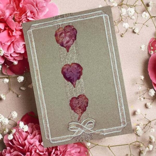 Handmade Happy Valentine's Day Card for Her, Him or Everyone with dried three autumn leaves and bow.