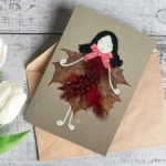 Handmade Luxury Birthday Card for Her. The card is made out of leaves and feathers. Made in the UK.