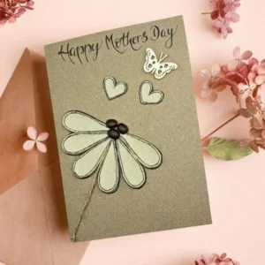 Handmade-mothers-day-card-with-flower-hearts-and-butterfly Best Handmen Grateful Card for Special Mum with flower, Butterfly and hearts on brown paper.