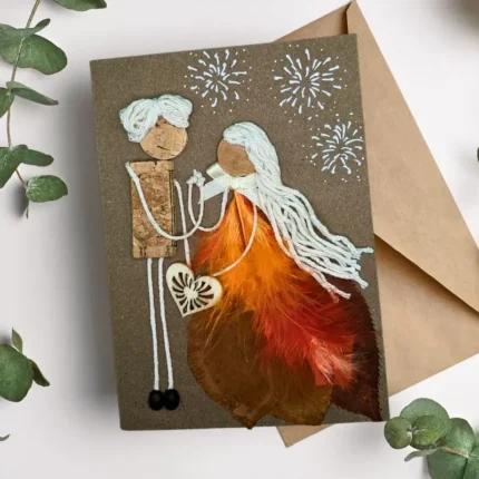 Personalised Handmade Anniversary Card: Starlight Gift. Made of cork, orange feathers and wooden heart. Made in the UK.