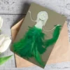 Handmade Personalised Birthday Card - Belly Dancer. Made of green feathers, wood and cotton on brown paper.