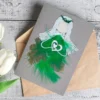 Handmade romantic love card for girlfriend featuring a green and white women holding a heart, designed for a girlfriend.