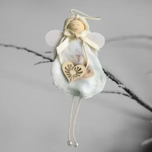 Handmade Seashell Christmas Ornament - A Coastal Christmas Treasure Handmade Seashell Christmas Ornament made of white seashell, wooden heart and wings.