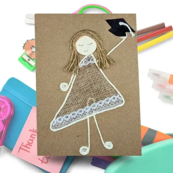 Handmade thank you graduation card featuring a girl in a graduation gown holding a cap, celebrating her achievement.