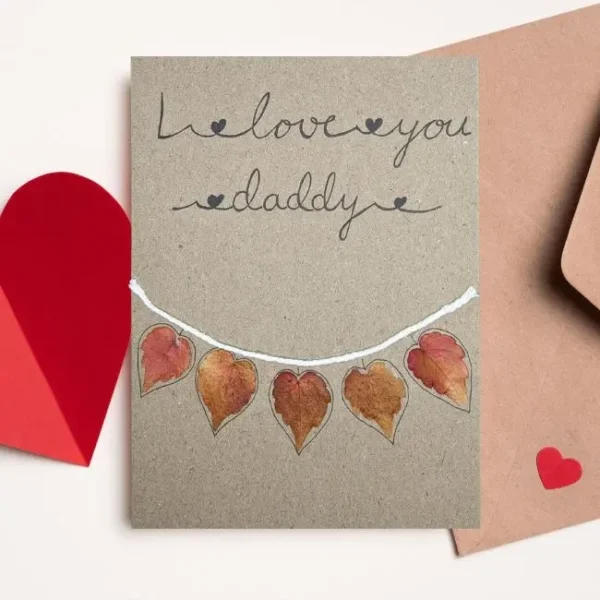 Heartfelt greeting card for Dad with the text ‘I Love You, Daddy’. It is made of leaves on reusable brown paper.