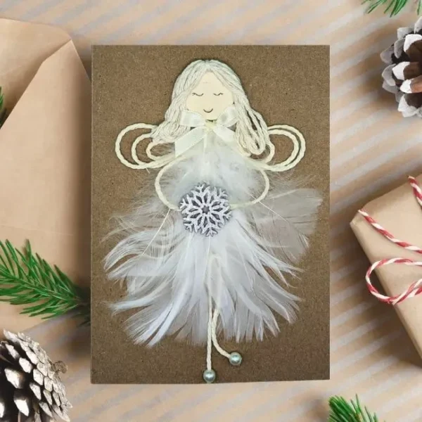 Heavenly Beautiful Handmade Angel Christmas Card Beautiful Handmade Angel Christmas Card for wife featuring a girl made of a white feather, holding a wooden snowflake.