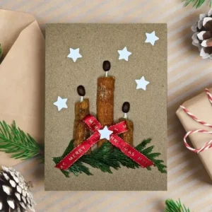 Luxury Handmade Christmas Greeting Card – Smell the Holiday image 1 Handmade Christmas Greeting Card made of three cinnamon sticks and a red bow.