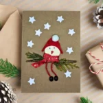 Handmade Christmas Card with Santa for Kids with a bird pretending to be Santa Claus.