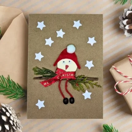 Handmade Christmas Card with Santa for Kids with a bird pretending to be Santa Claus.