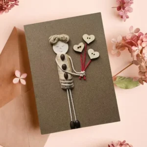 Perfect Handcrafted Card for Your Mother Perfect Handcrafted Card for Your Mother made of seashell and coffee beans on brown paper.