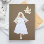 Personalised Handmade First Holy Communion Card for Girls made of white cotton, white fabric, wood and cork.