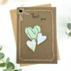Personalised Handmade Thank You Card with three hearts made of paper and cotton bow with coffee bean.