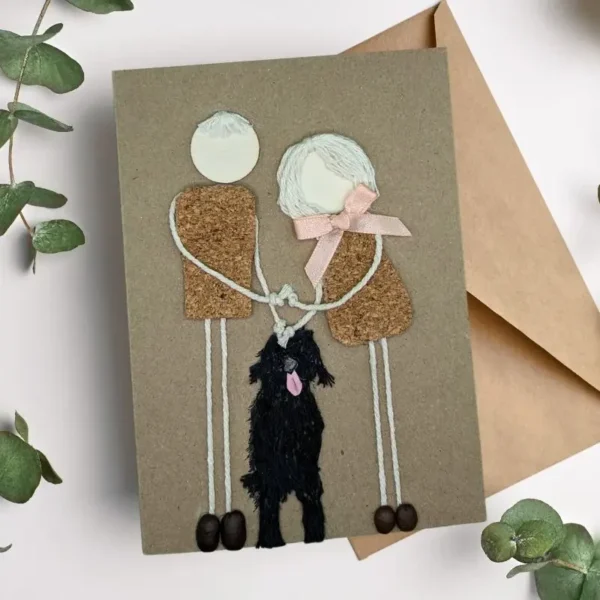Handmade Personalised Wedding Anniversary Card: Paws and Love. crafted by hand using cork, yarn, and black wood. UK made.