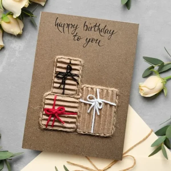 Handmade perfect happy birthday card - personalised and made with care with three present boxes. Made in the UK.
