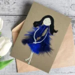 Handmade personalised romantic card for her with the woman made of violet feathers and leaves.