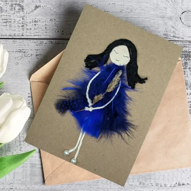 Personalised Romantic Card for Her from Husband – Be My Valentine Handmade personalised romantic card for her with the woman made of violet feathers and leaves.