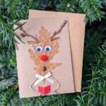 Best Handmade Funny Christmas Card on a stand. with Rudolf made of dried leaf with googly eyes with envelope.