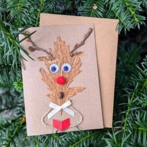 Best Handmade Funny Christmas Card on a stand. with Rudolf made of dried leaf with googly eyes with envelope.