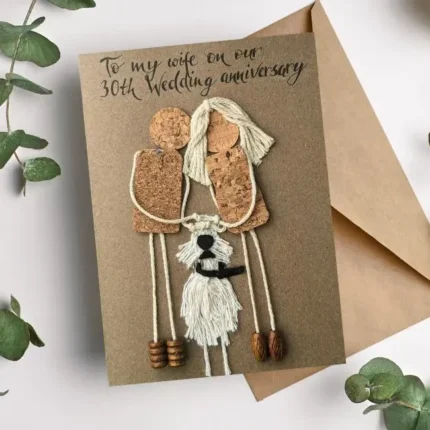 Handmade 30th Wedding Anniversary Card featuring couple with dog, made of cork and wool.