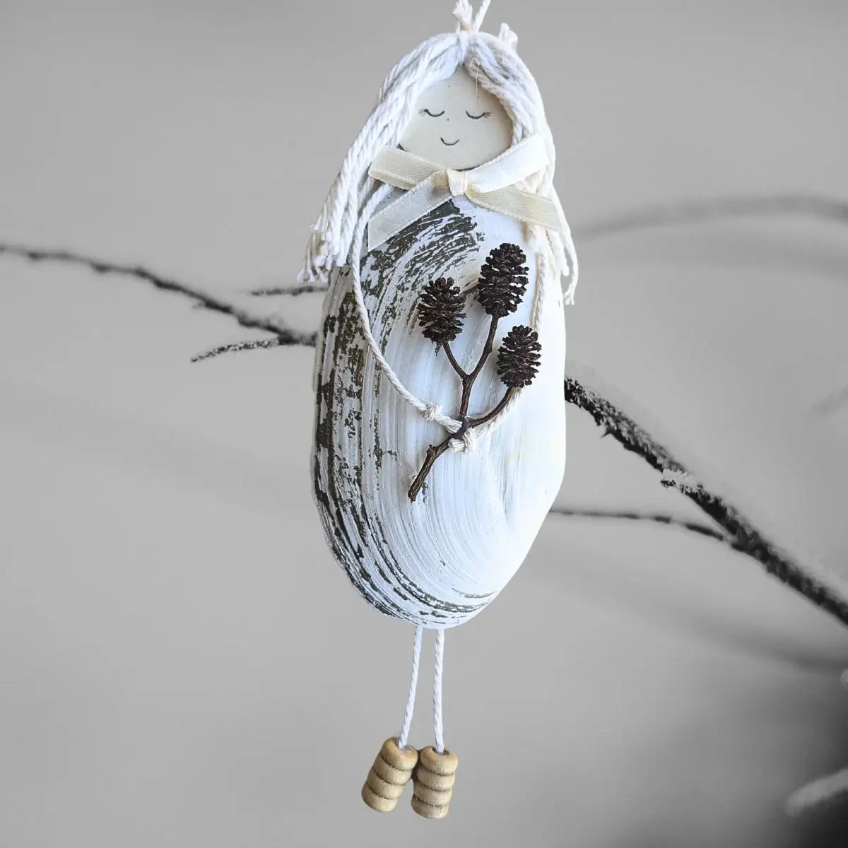 Unique and Beautiful Handmade Shell Angel Ornament Beautiful Handmade Shell Angel Ornament made of white seashell in the UK.
