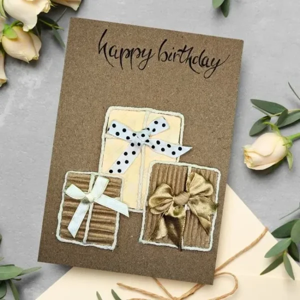 A unique Greetings Card for Birthday showcasing colourful gift boxes, crafted with care to convey warm birthday wishes.