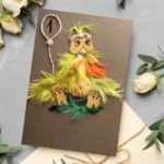 Handmade 1st Birthday Card for baby birthday with Yellow Phoenix made of feathers. Created in the UK.