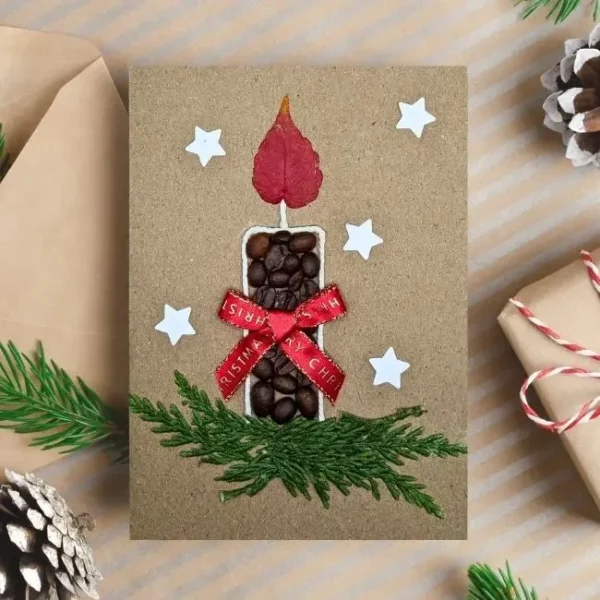 Handmade Candle Christmas Card with Candle and Ribbon made of coffee beans, leaf, green twig and paper stars.