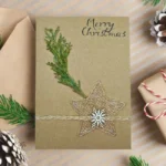 Unique Handmade Christmas card featuring pine cones and a star design, perfect for holiday greetings.