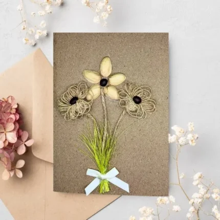 Beautiful and unique handmade thank you card with pistachio and jute flowers. Made in Bollington, UK.