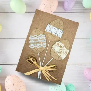 Wonderful Handmade Easter Card - Flower Bouquet Made of Easter Eggs Handmade Easter card featuring a flower bouquet made of colourful Easter eggs, adorned with lace and ribbon on a white background.