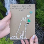 Handmade Unique Birthday Card for Dog Lovers with a yarn outline of a German Shepherd and three heart embellishments.