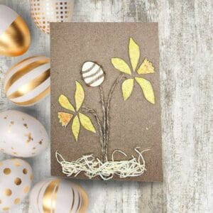Handmade Easter card showcasing beautifully crafted gold and white eggs, representing the handmade Easter card collection.